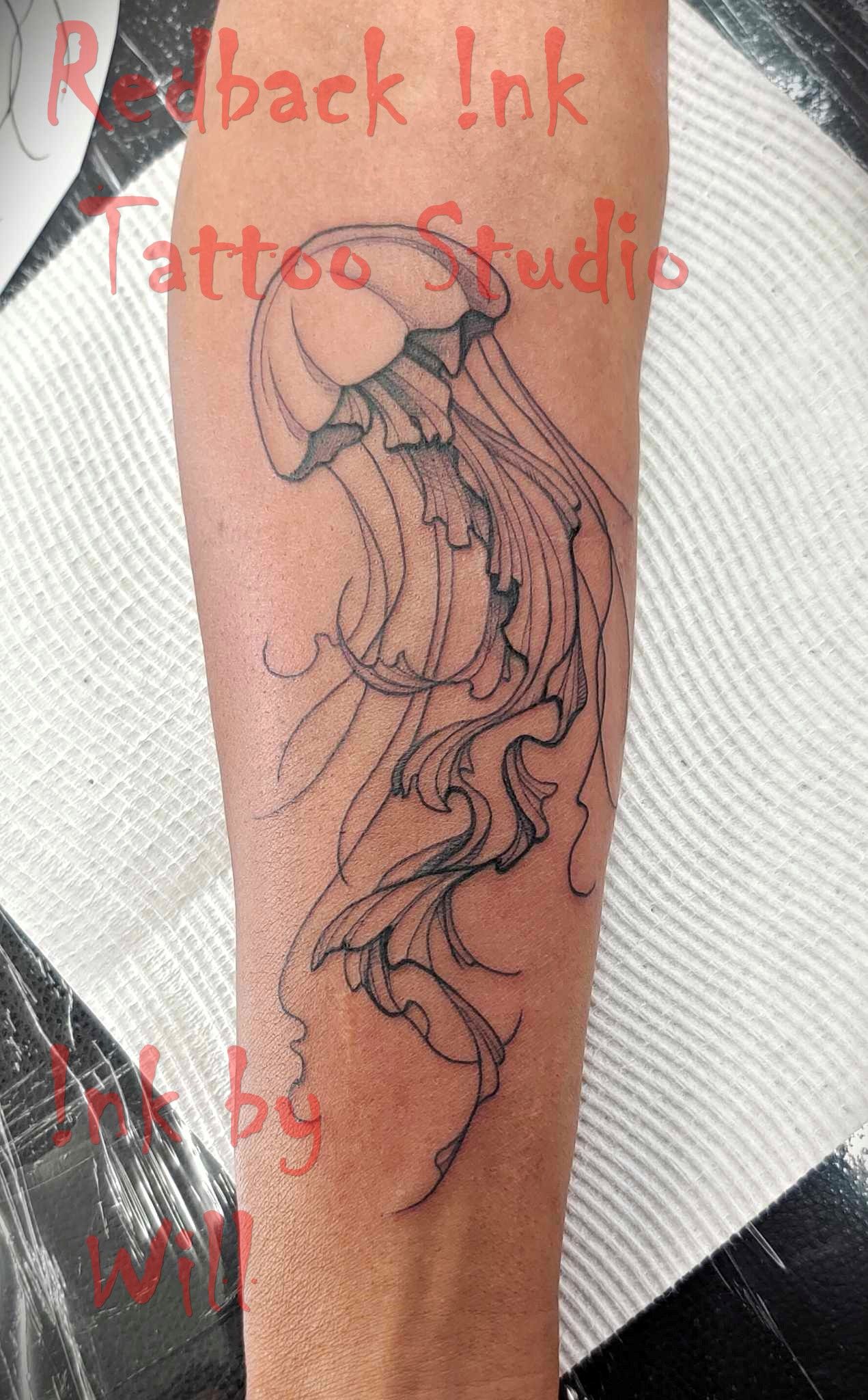 Black Jellyfish Tattoo on Arm — Redback !nk Tattoo Studio in Kawana, QLD