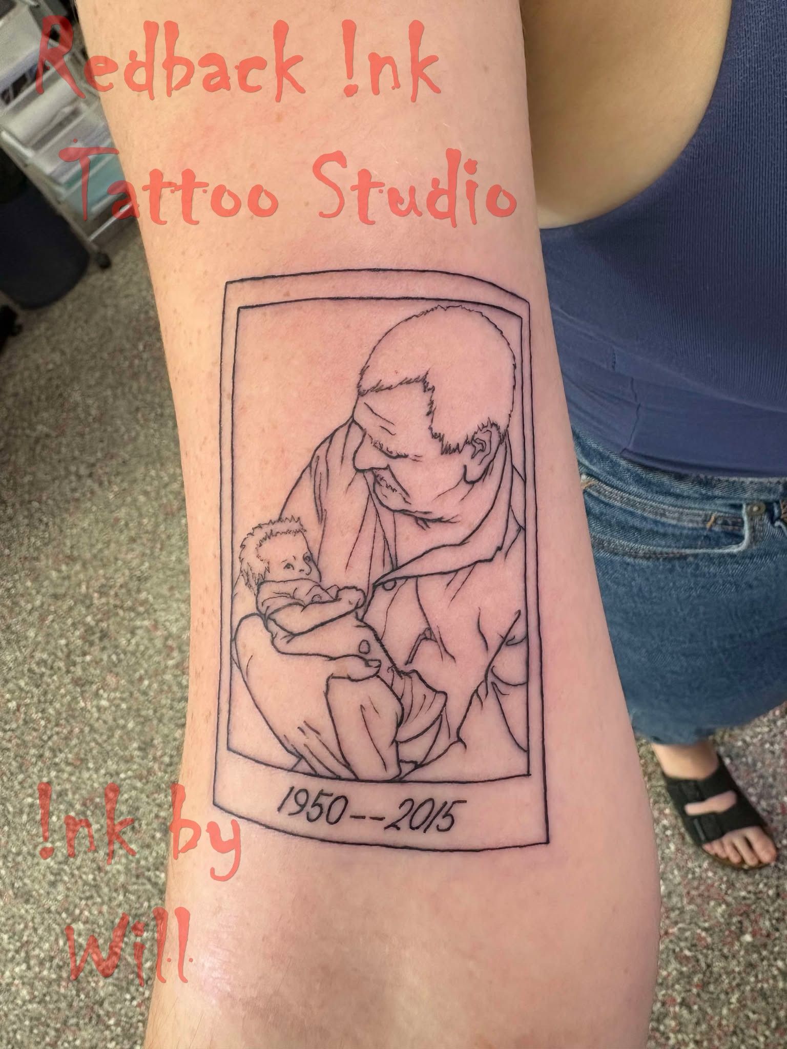 Tattoo of a Person Holding a Baby Inside a Polaroid Frame — Redback !nk Tattoo Studio in Kawana, QLD