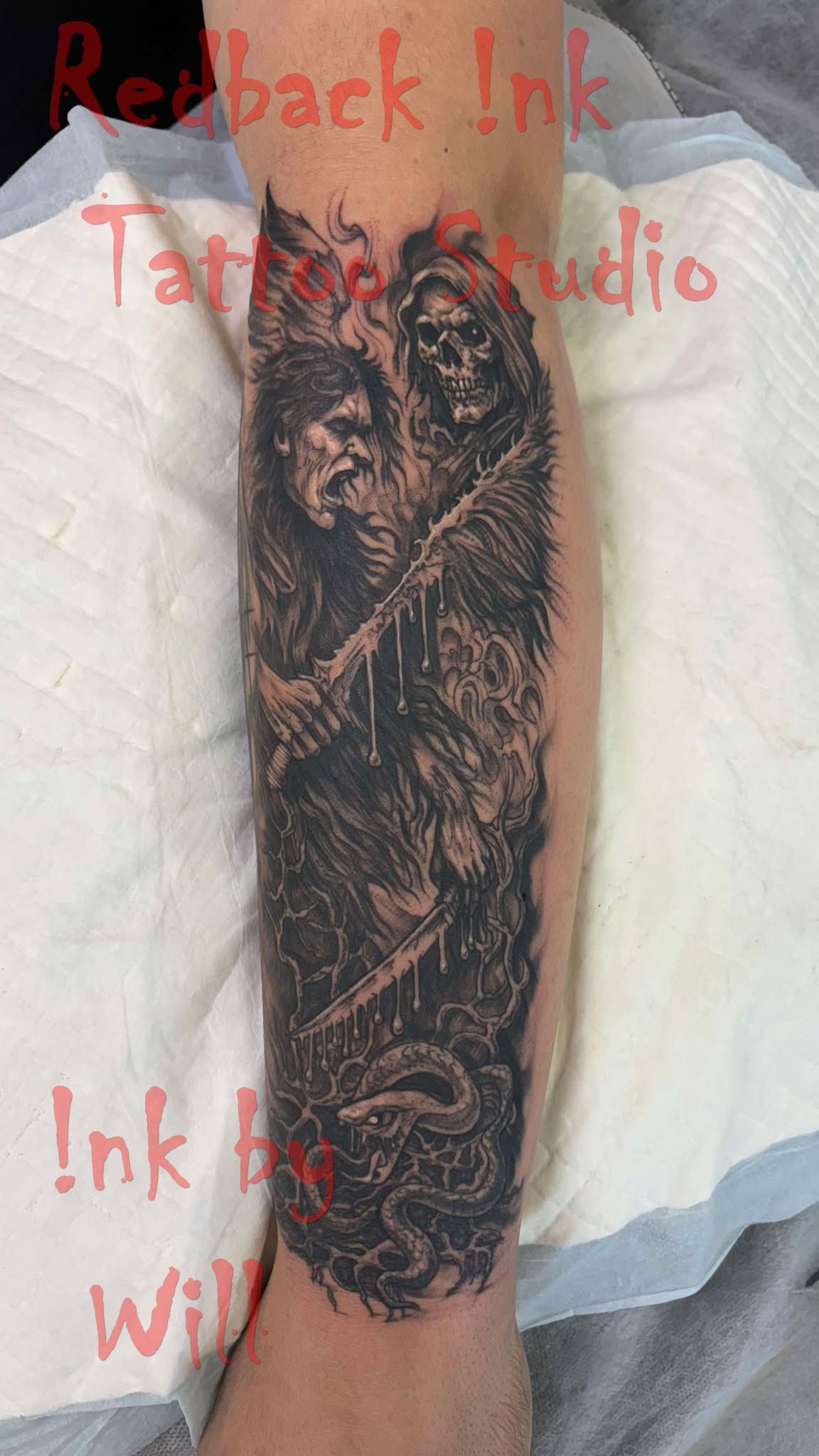 Black Tattoo on an Arm Depicting Two Figures in a Dark, Detailed Scene — Redback !nk Tattoo Studio in Kawana, QLD