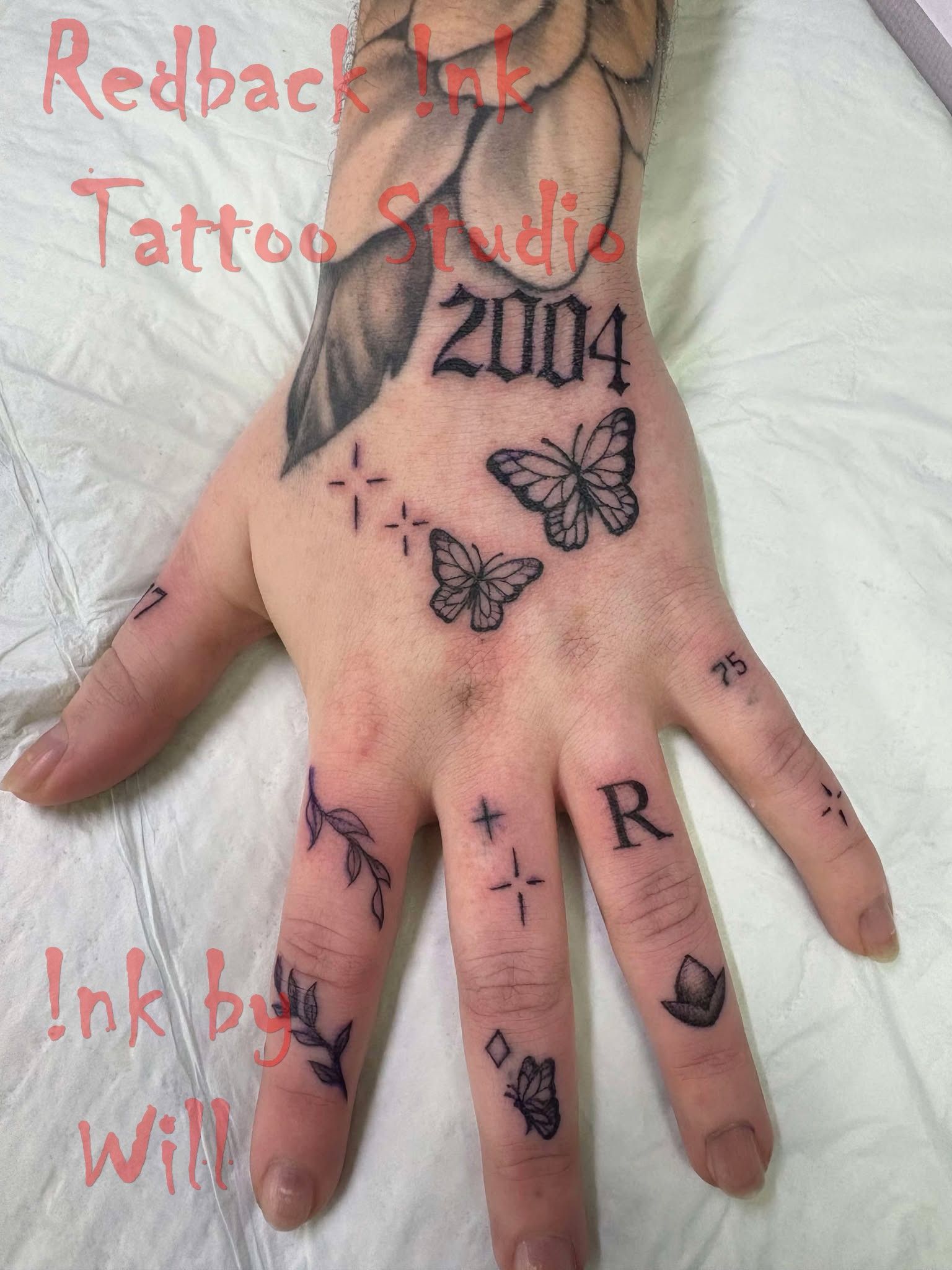 Hand With Tattoos — Redback !nk Tattoo Studio in Kawana, QLD