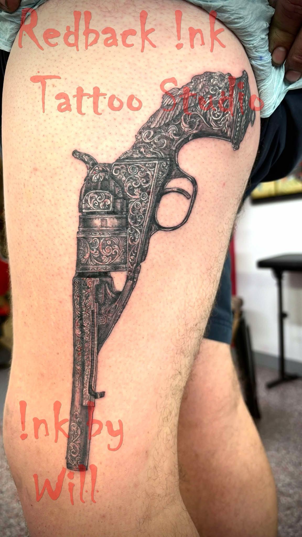 Tattoo of an Ornate Pistol on a Person's Thigh — Redback !nk Tattoo Studio in Kawana, QLD