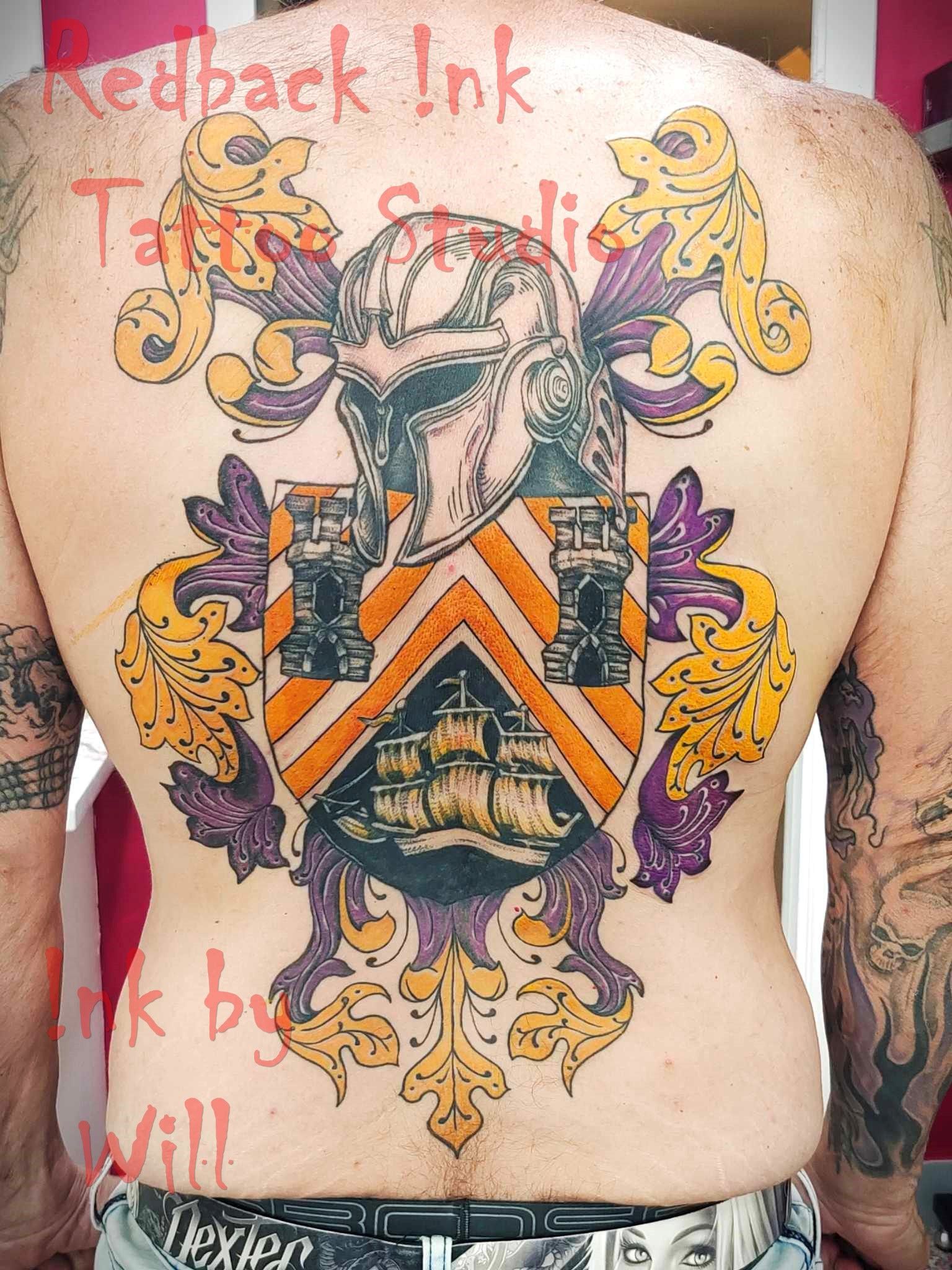 Man's Back Tattoo of a Colourful Coat of Arms — Redback !nk Tattoo Studio in Kawana, QLD
