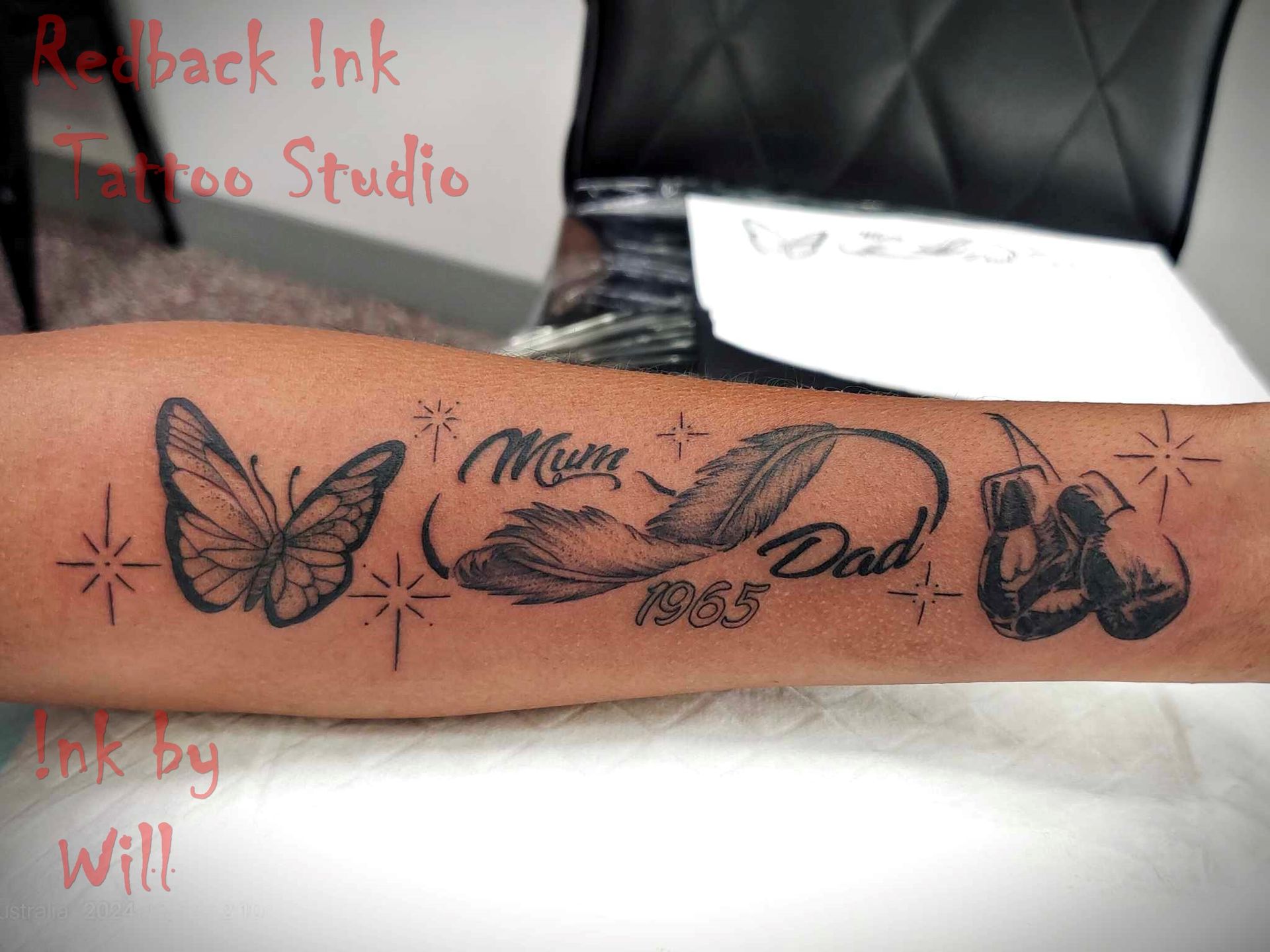 Tattoo on Arm, Butterfly, Feather — Redback !nk Tattoo Studio in Kawana, QLD
