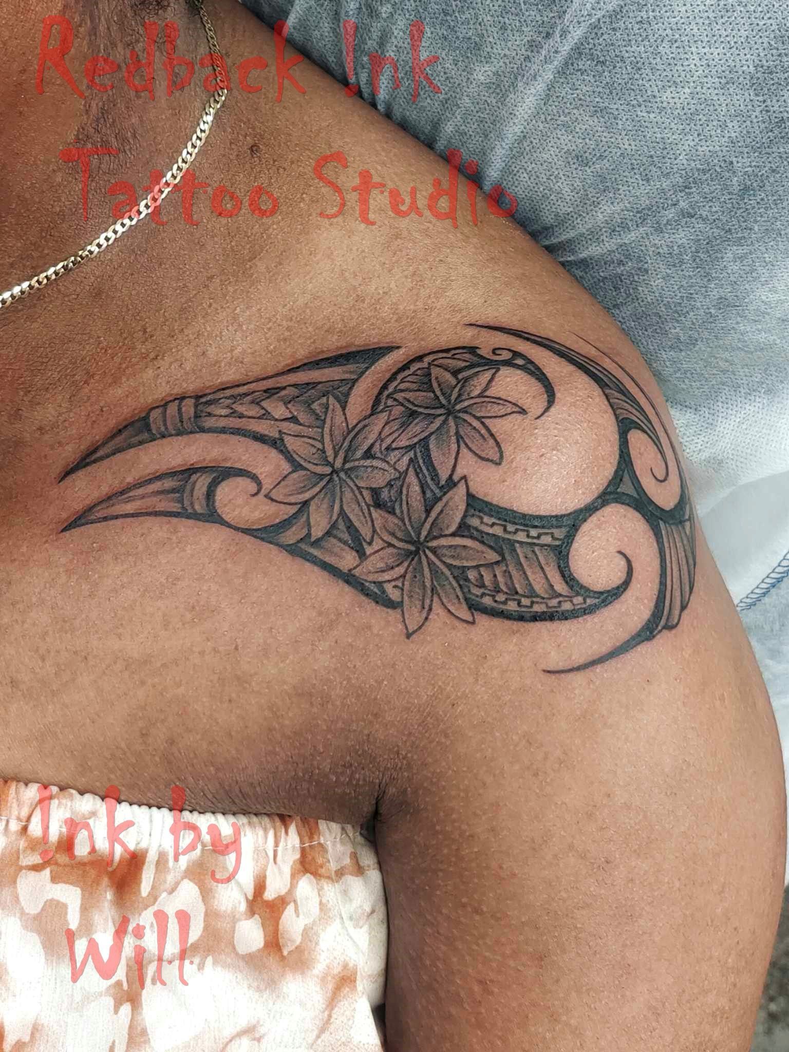 Tattoo on Shoulder Featuring Polynesian Patterns and Flowers — Redback !nk Tattoo Studio in Kawana, QLD