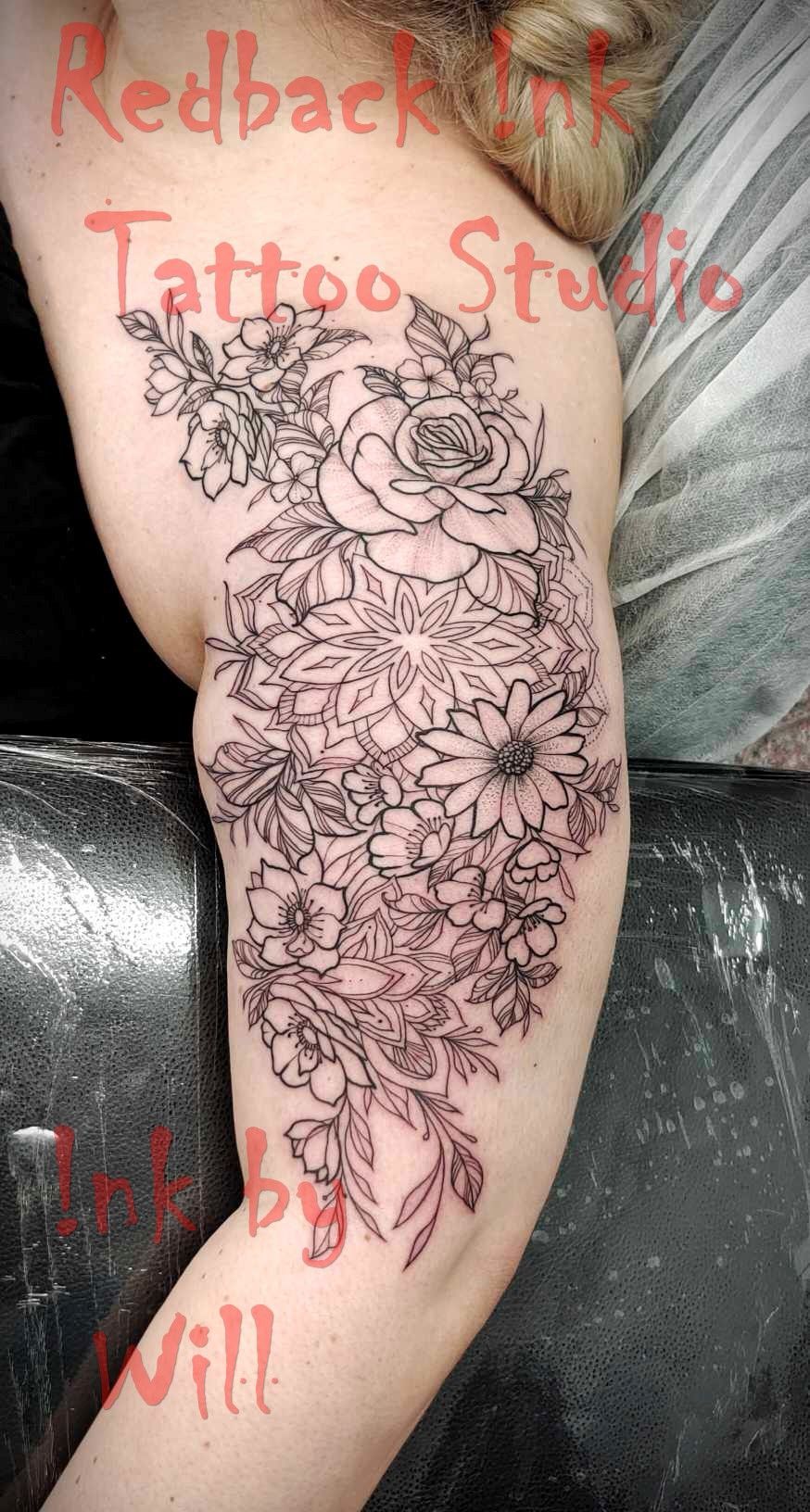 Black Outline Floral Tattoo on a Person's Arm — Redback !nk Tattoo Studio in Kawana, QLD