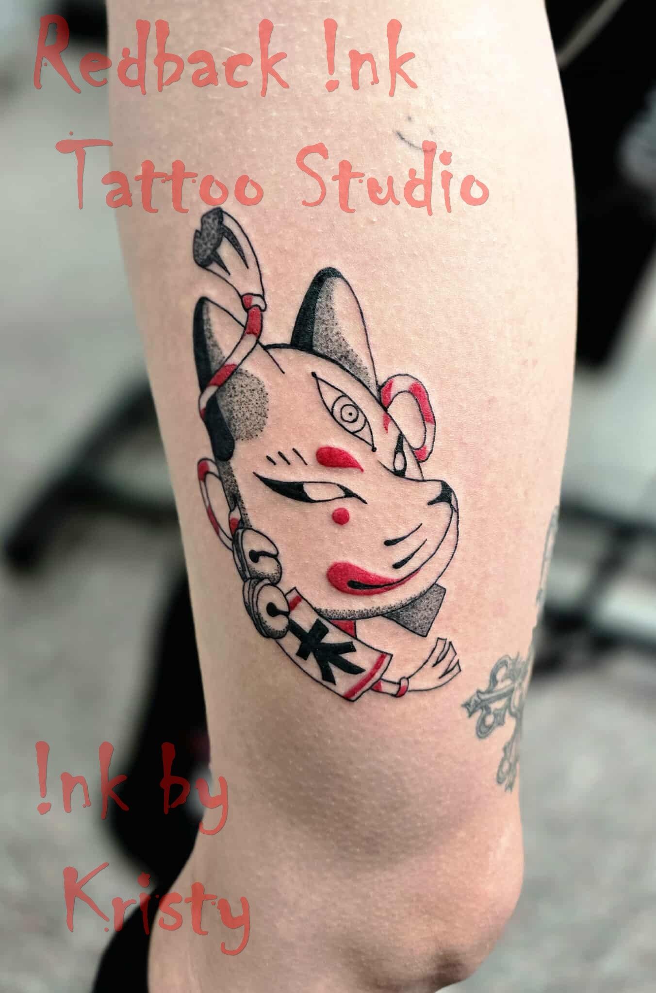 Tattoo of a Japanese Fox Mask on a Leg — Redback !nk Tattoo Studio in Kawana, QLD