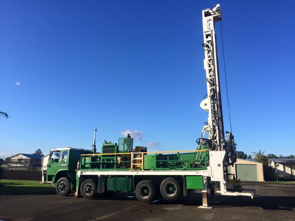 A Green and White Truck is Parked in a Parking Lot — Kowaltzke Drilling Services in Gatton, QLD