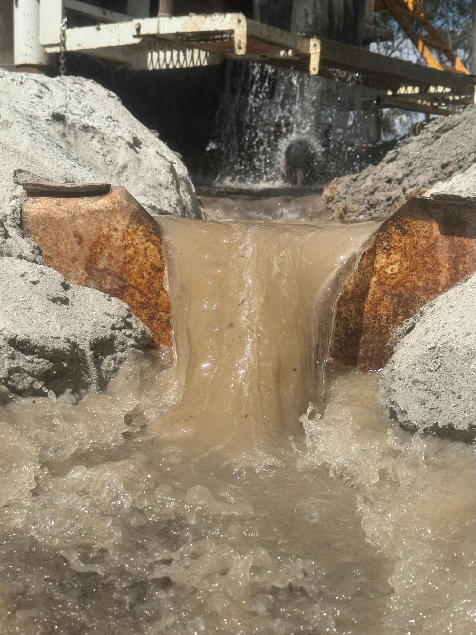 Bore Water Flowing Over Irrigation Channel — Kowaltzke Drilling Services in Plainland, QLD
