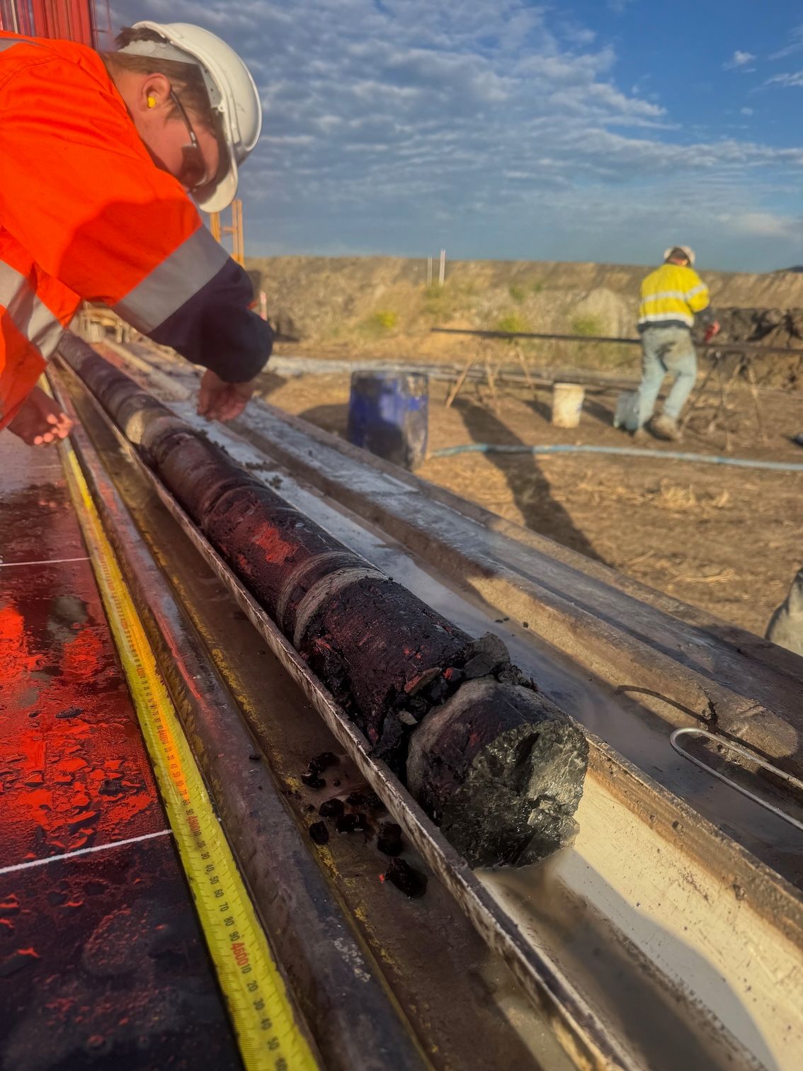 Core Sample and 2 Workmen — Kowaltzke Drilling Services in Plainland, QLD