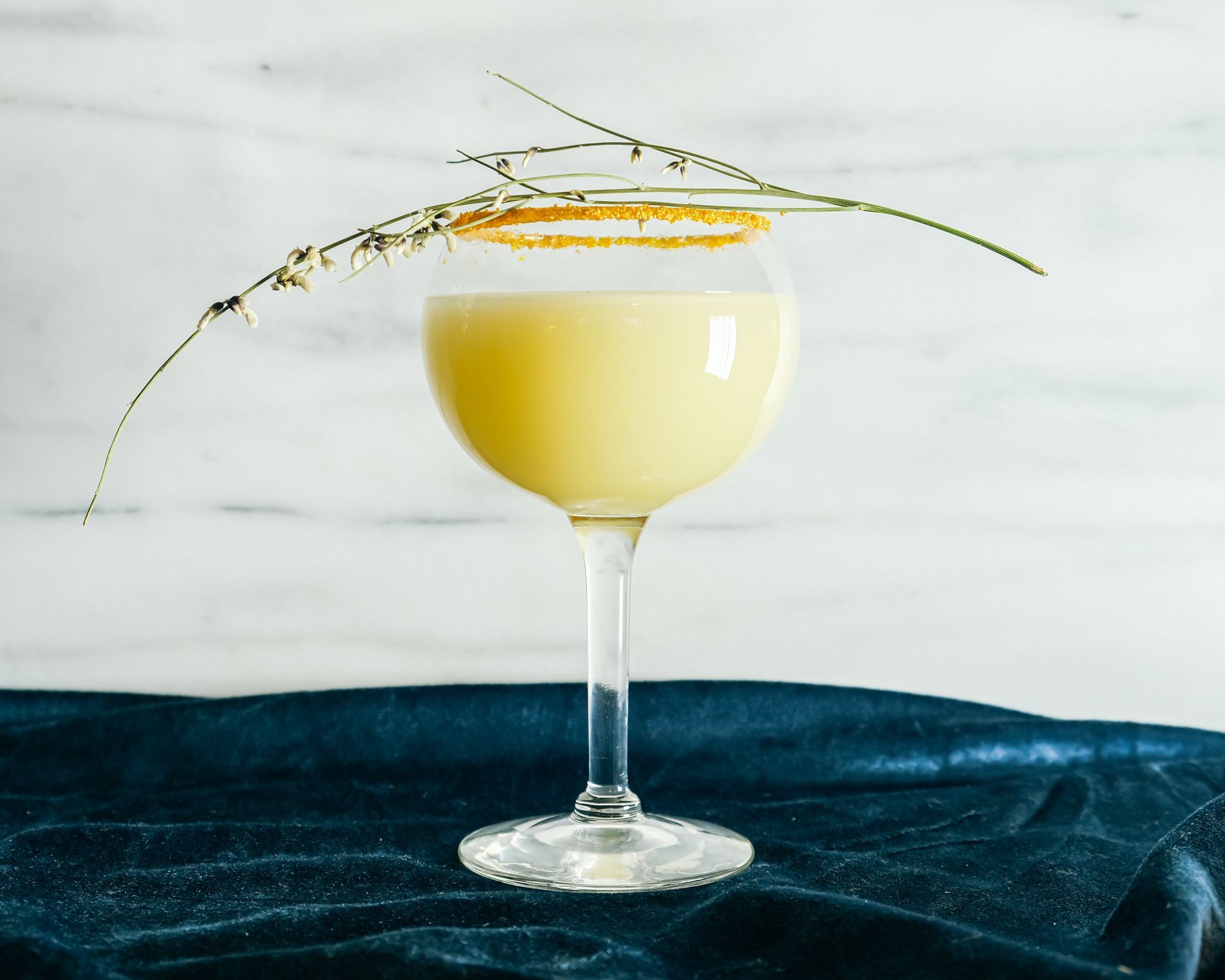 Signature cocktail with lavender garnish at Montana wedding