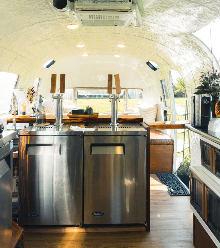 Commercial kitchen inside Airstream mobile bar trailer
