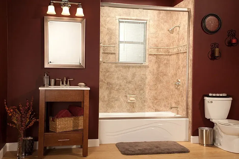 Bright bathroom with freestanding tub, woven pendant light, and neutral decor, centered between two windows.
