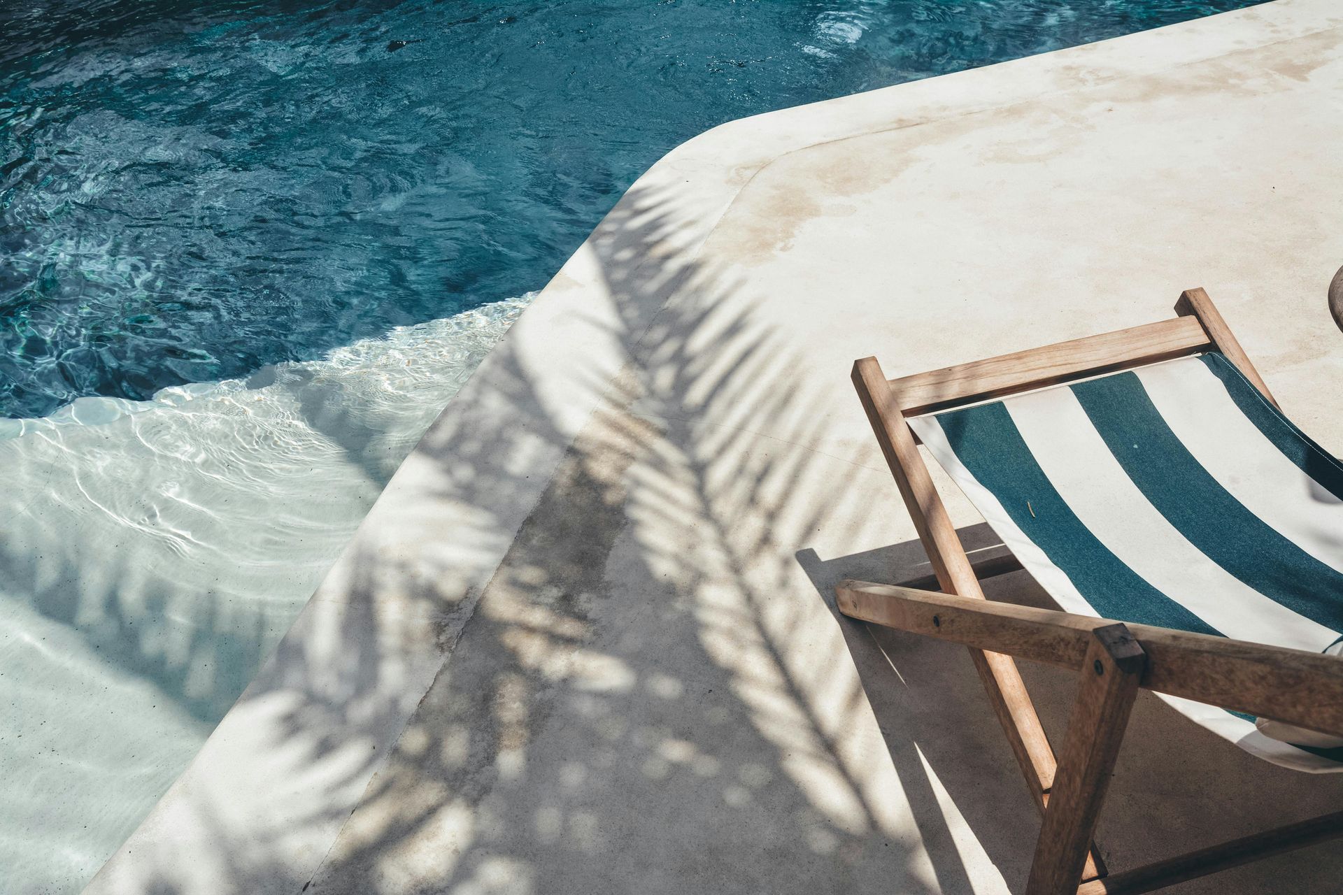 A White Object is Floating in the Water of a Swimming Pool — Intouch Pools & Spas in Forster, NSW