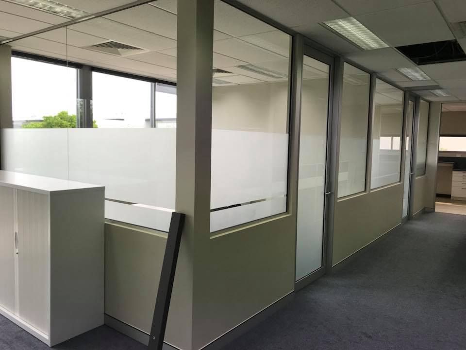 A Hallway In An Office Building With A Lot Of Windows — Home Tint Sunshine Coast Window Tinting In Maroochydore, QLD