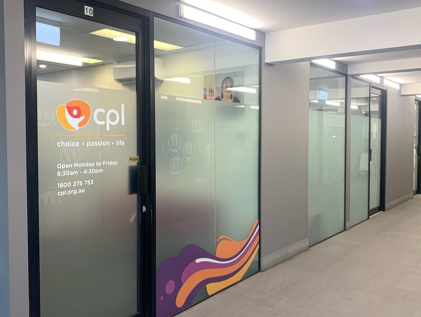 A Hallway With A Glass Door And A Sign That Says Cpl On It — Home Tint Sunshine Coast Window Tinting In Maroochydore, QLD