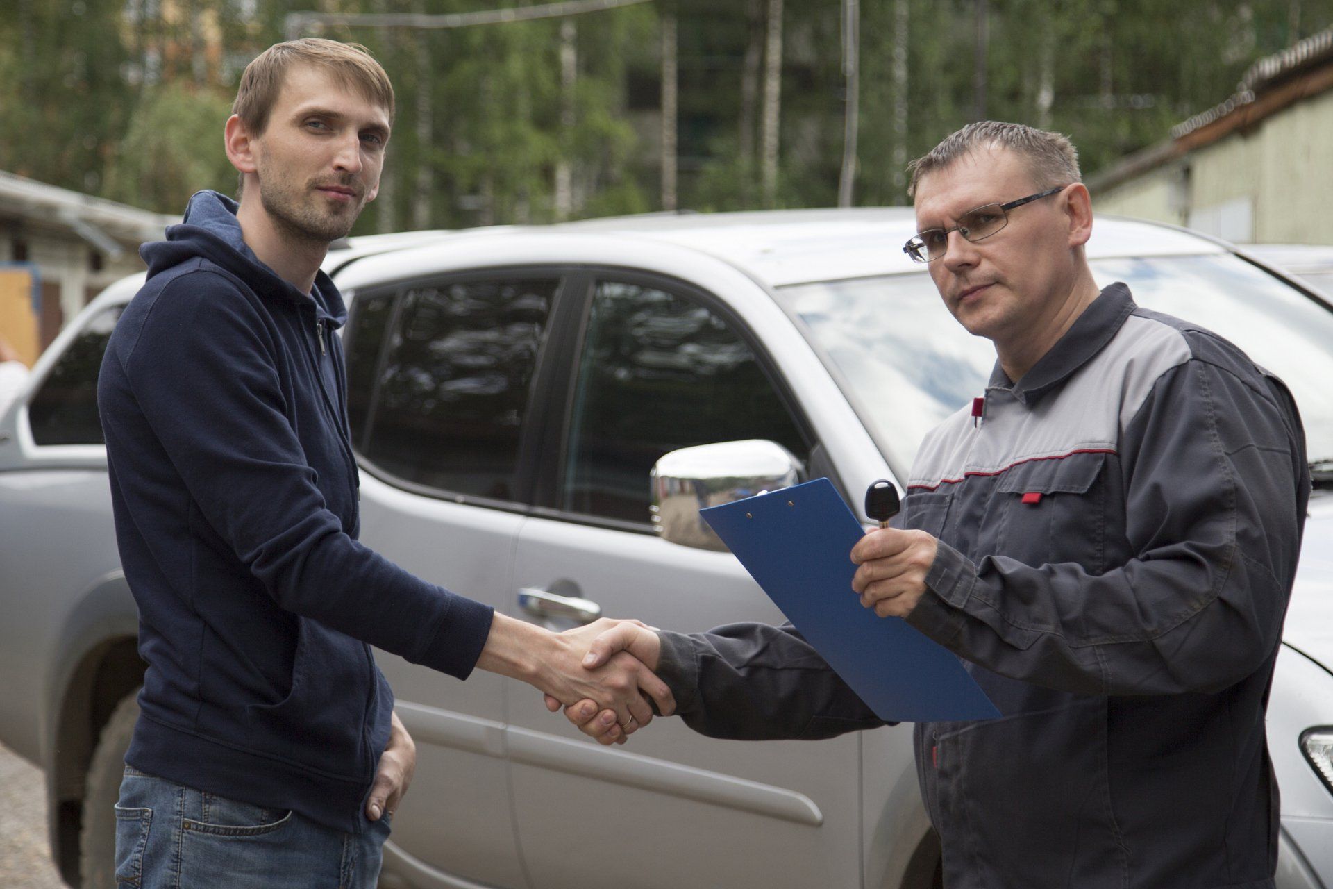 Handsome auto service workers
