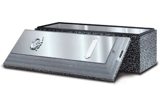 Silver metal toolbox with a textured black base and hinged lid on a white background