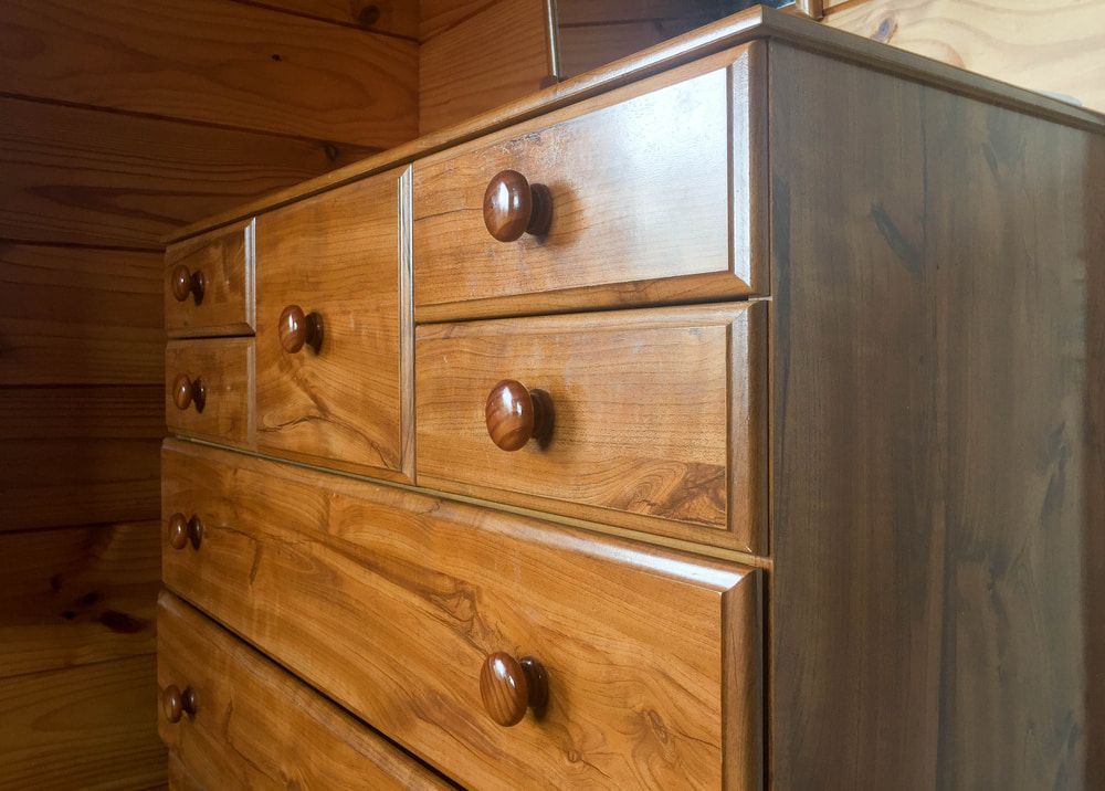 Brown Wooden Chest Of Drawers — Removalists in Warwick, QLD