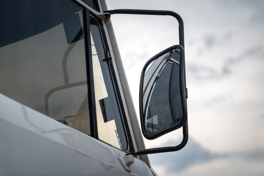 A Close Up Of A Side View Mirror On A Truck — Petrena Windscreens In Toowoomba City, QLD