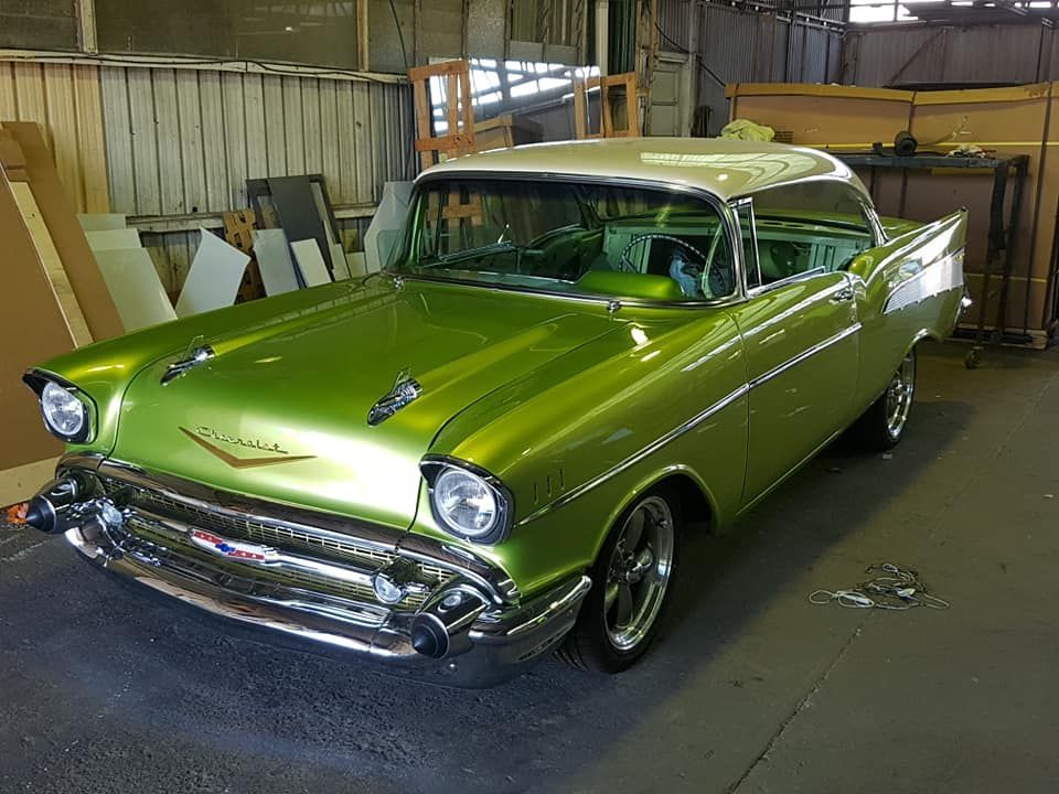 A Green Classic Car Is Parked In A Garage — Petrena Windscreens In Plainland, QLD
