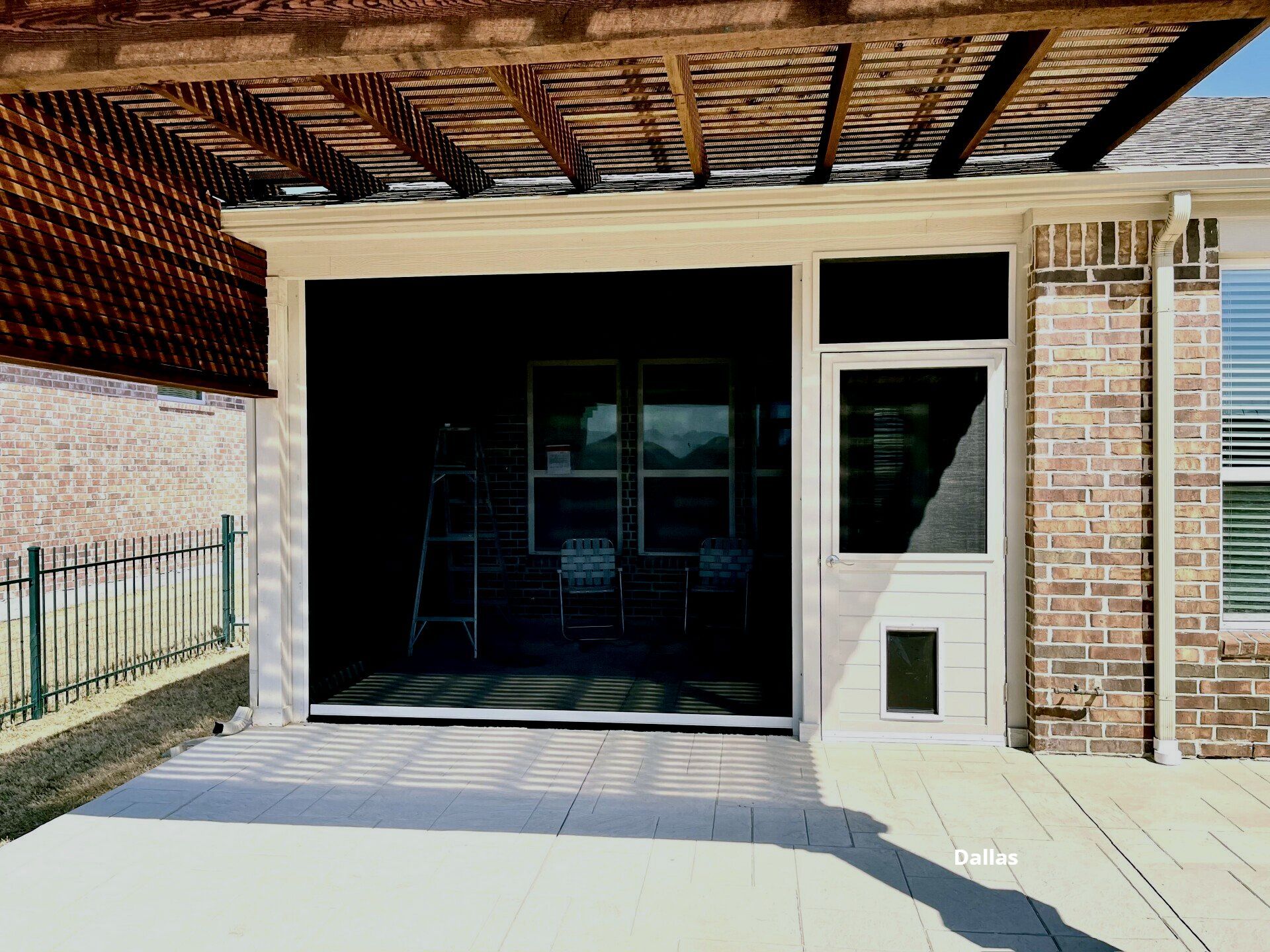 Retractable patio shade by the pool