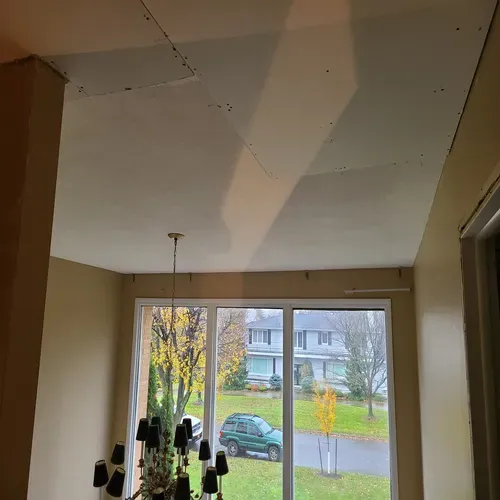 This picture highlights our team's expertise in drywall repair, resulting in a smooth finish for this Buffalo home.