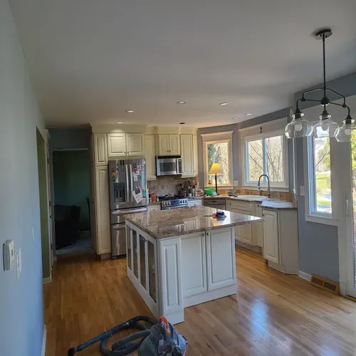 A gypsum wallboard installation can make a big difference in the look and feel of a room, as shown in this Buffalo project photo.