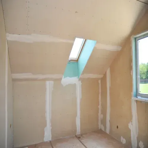 This photo showcases a successful popcorn ceiling removal project completed by our expert team at Drywall Repair Buffalo. Our professional drywall services, including popcorn ceiling removal, are designed to help homeowners in Buffalo, Cheektowaga, Sloan, and the surrounding areas update their homes with ease. The photo captures the transformation from an outdated popcorn ceiling to a smooth and modern surface, free of the hazards and drawbacks of popcorn ceilings. Say goodbye to dusty, hard-to-clean, and dated popcorn ceilings with our top-notch popcorn ceiling removal services. Trust Drywall Repair Buffalo for all your drywall needs, and enjoy the benefits of a beautiful and updated home.