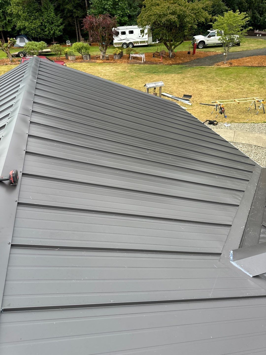 Roofing specialists replacing an aging roof on a home in Centralia, Washington.