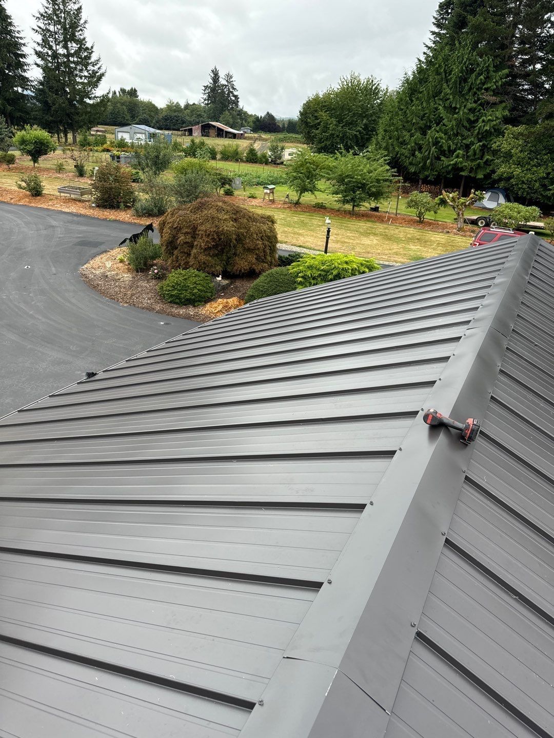 Roofing specialists replacing an aging roof on a home in Centralia, Washington.
