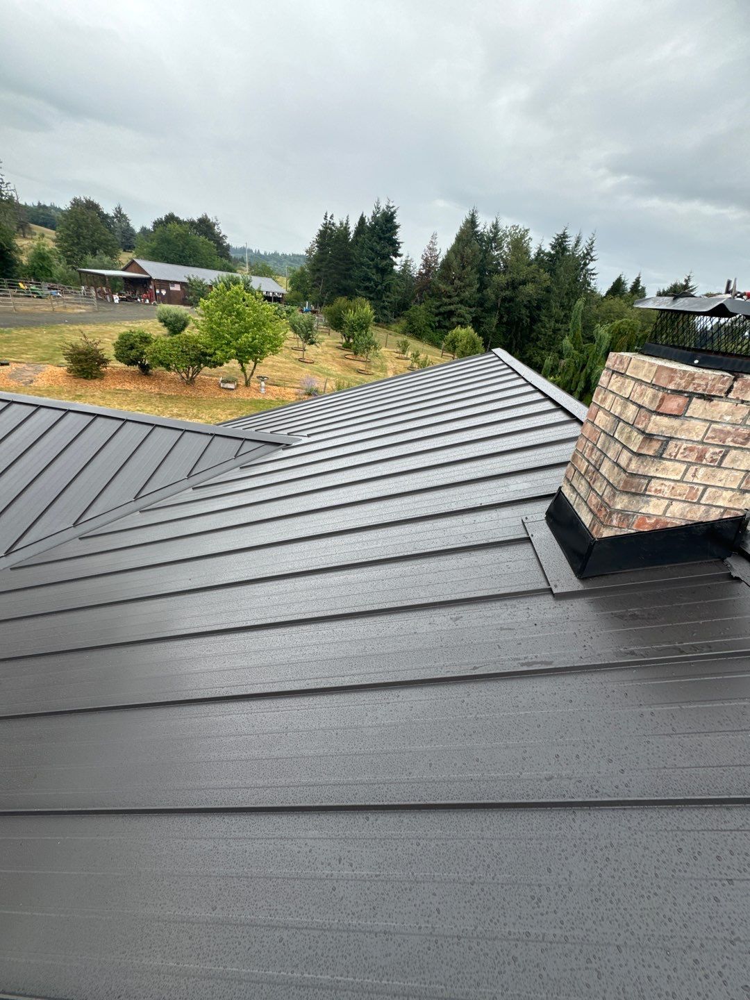 Standing seam metal roof installed by On Top Roofing in Yelm, Washington.