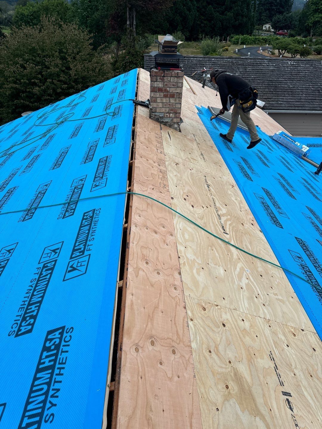 Completed asphalt shingle roof replacement for a homeowner in Olympia.