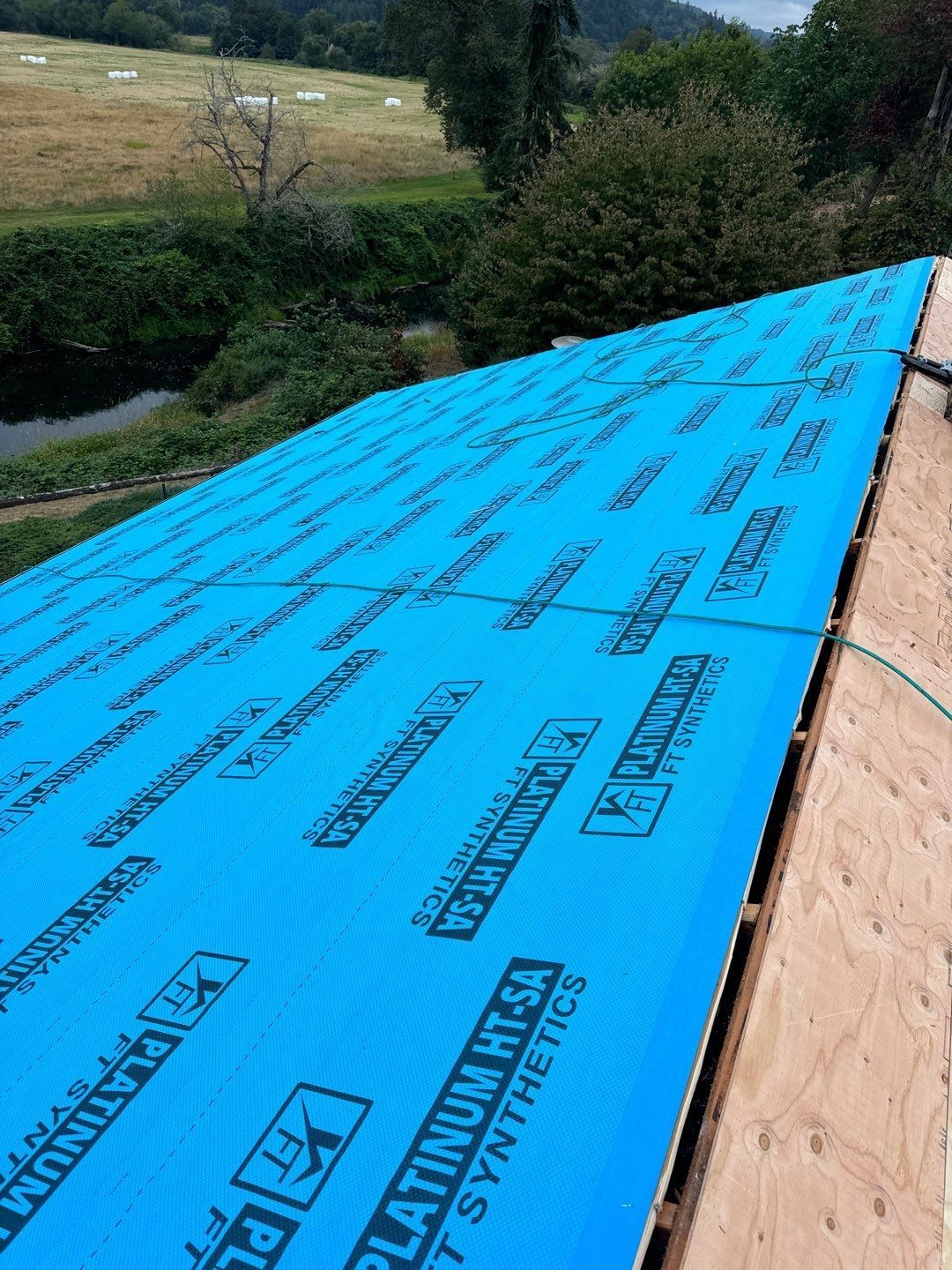 On Top Roofing crew installing a new residential roof in Olympia, Washington.