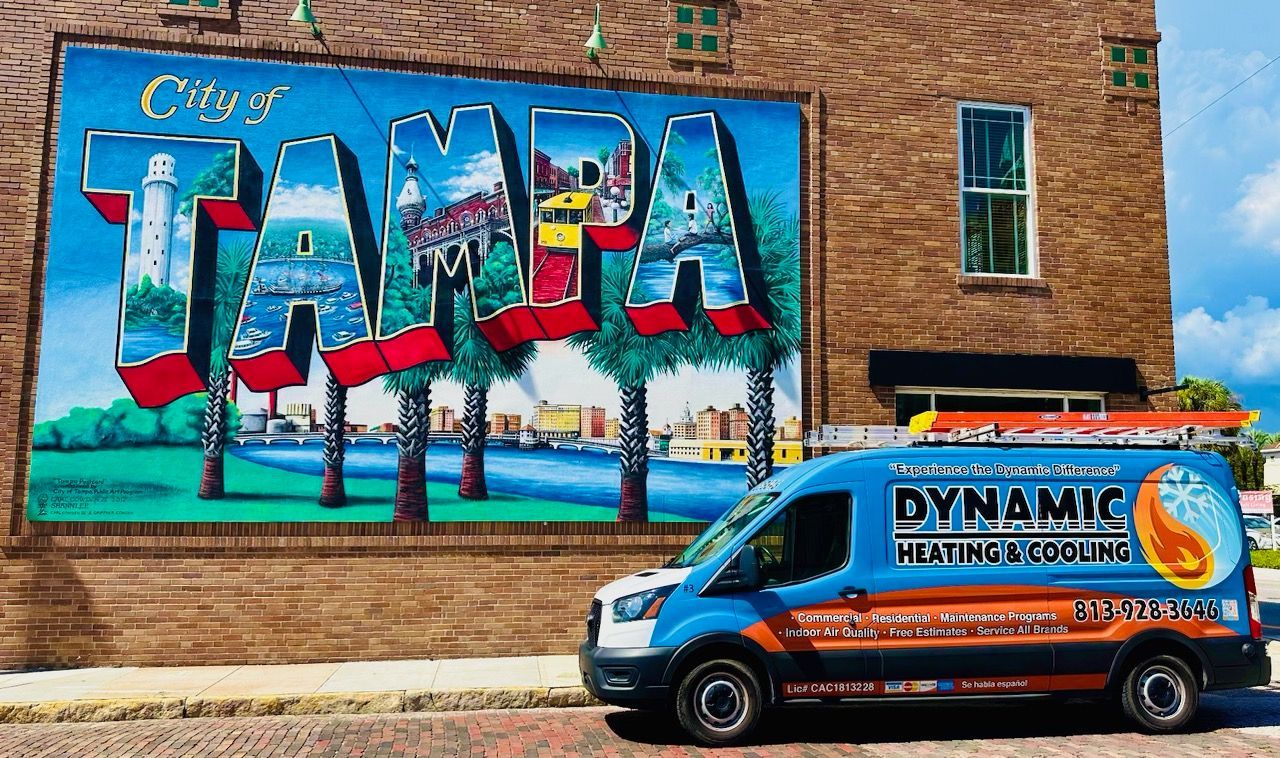 a painting of the city of tampa on a brick wall
