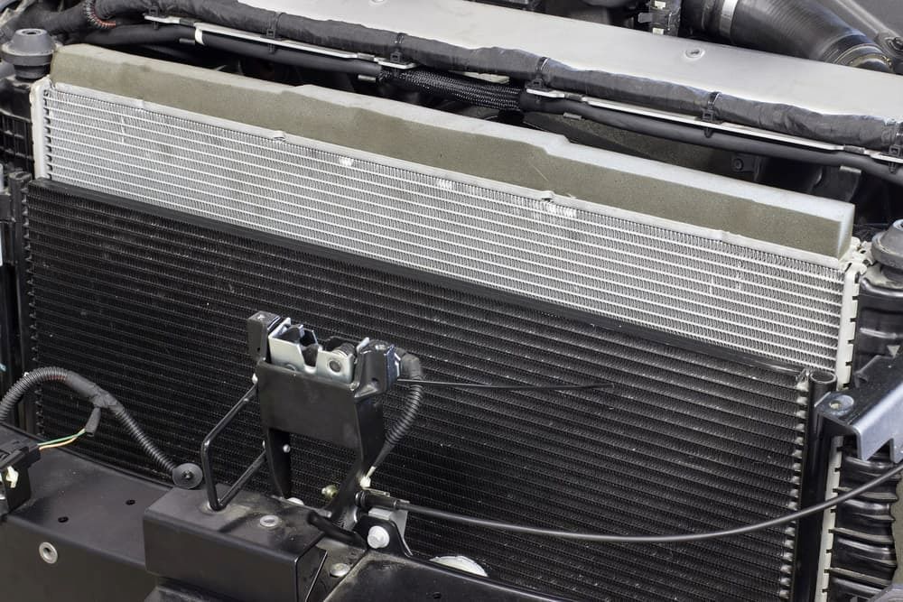 A Close up Of a Radiator in A Car Engine — Radiator Doctor In Pialba, QLD