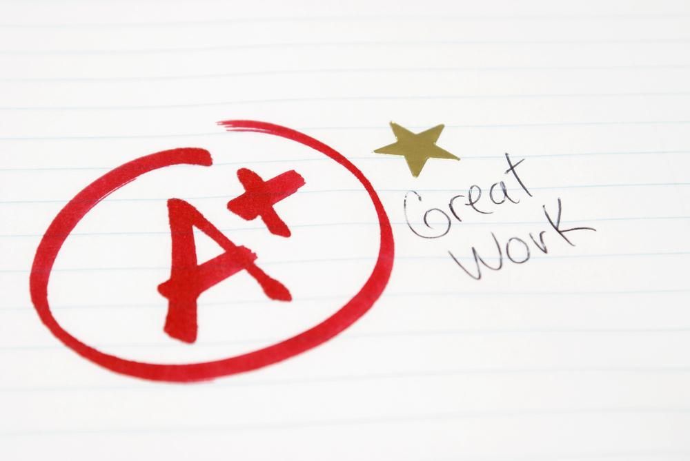 An a Plus Grade Is Written on A Piece of Paper — Al Roberts Education Centre in Wynnum West, QLD