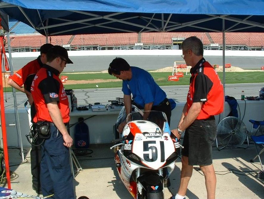 The number 51 is on the front of a motorcycle