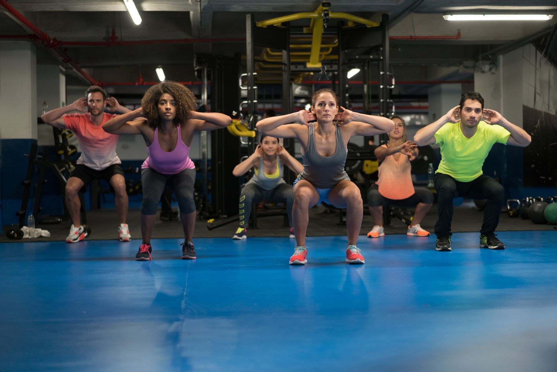 People Doing Yoga — Goodyear, AZ — Natalie's Fitness Elements Garage People Doing Yoga — Goodyear, AZ — Natalie's Fitness Elements Garage