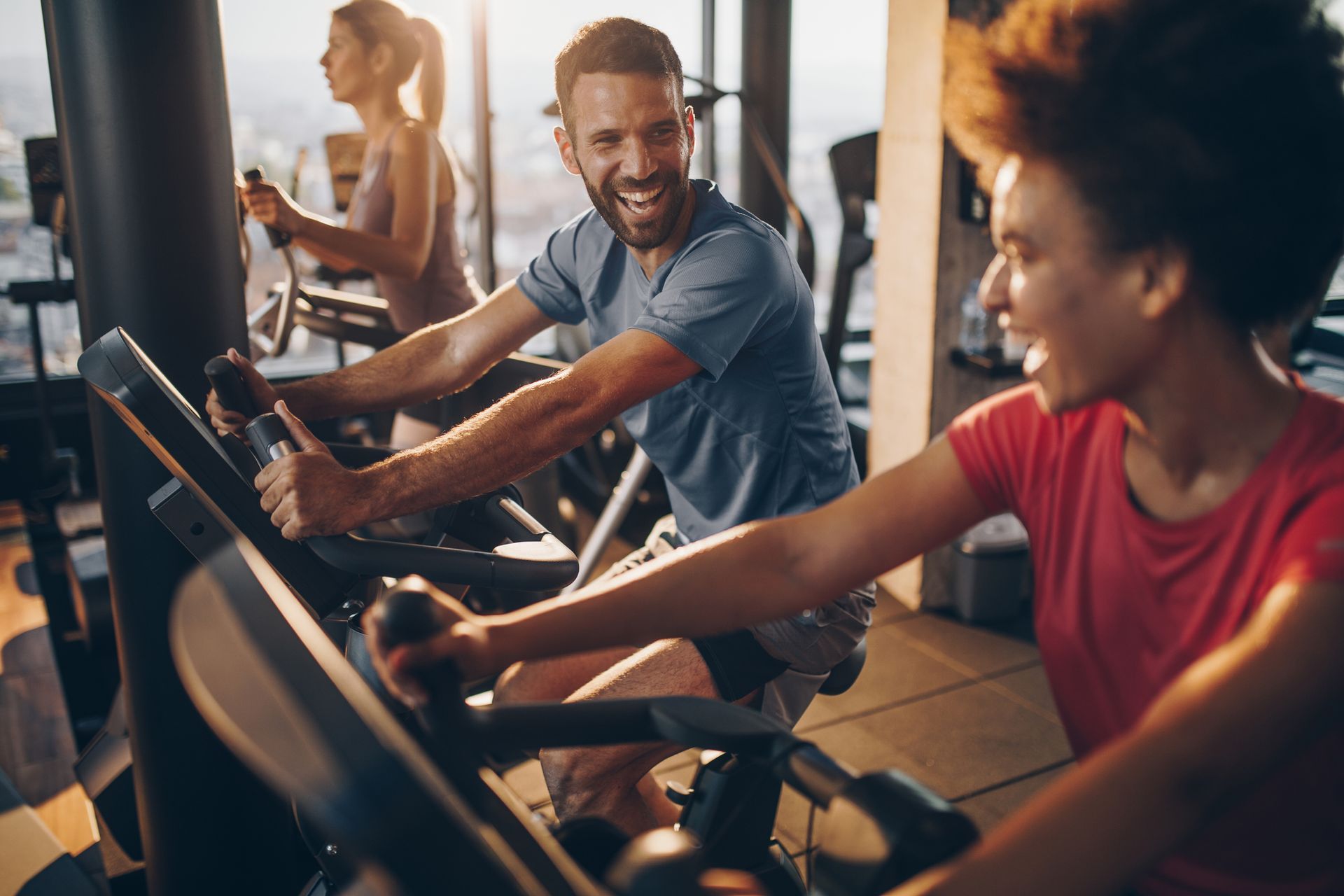 Two People Happy Exercising — Goodyear, AZ — Natalie's Fitness Elements Garage Two People Happy Exercising — Goodyear, AZ — Natalie's Fitness Elements Garage