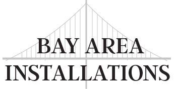 A logo for bay area installations with a bridge in the background.