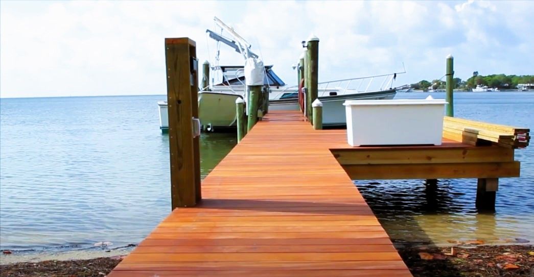 Dock Vs Raft Wood vs. Plastic Docks: Choosing Your Ideal Swimming Dock