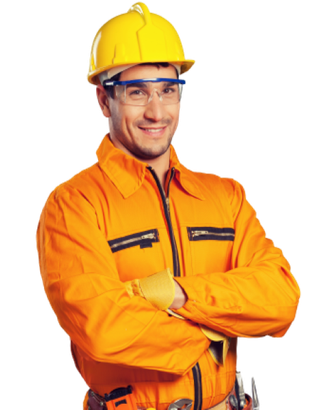 A man wearing a hard hat and goggles stands with his arms crossed