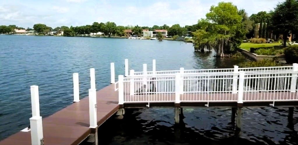 An expansive commercial dock extending into calm waters