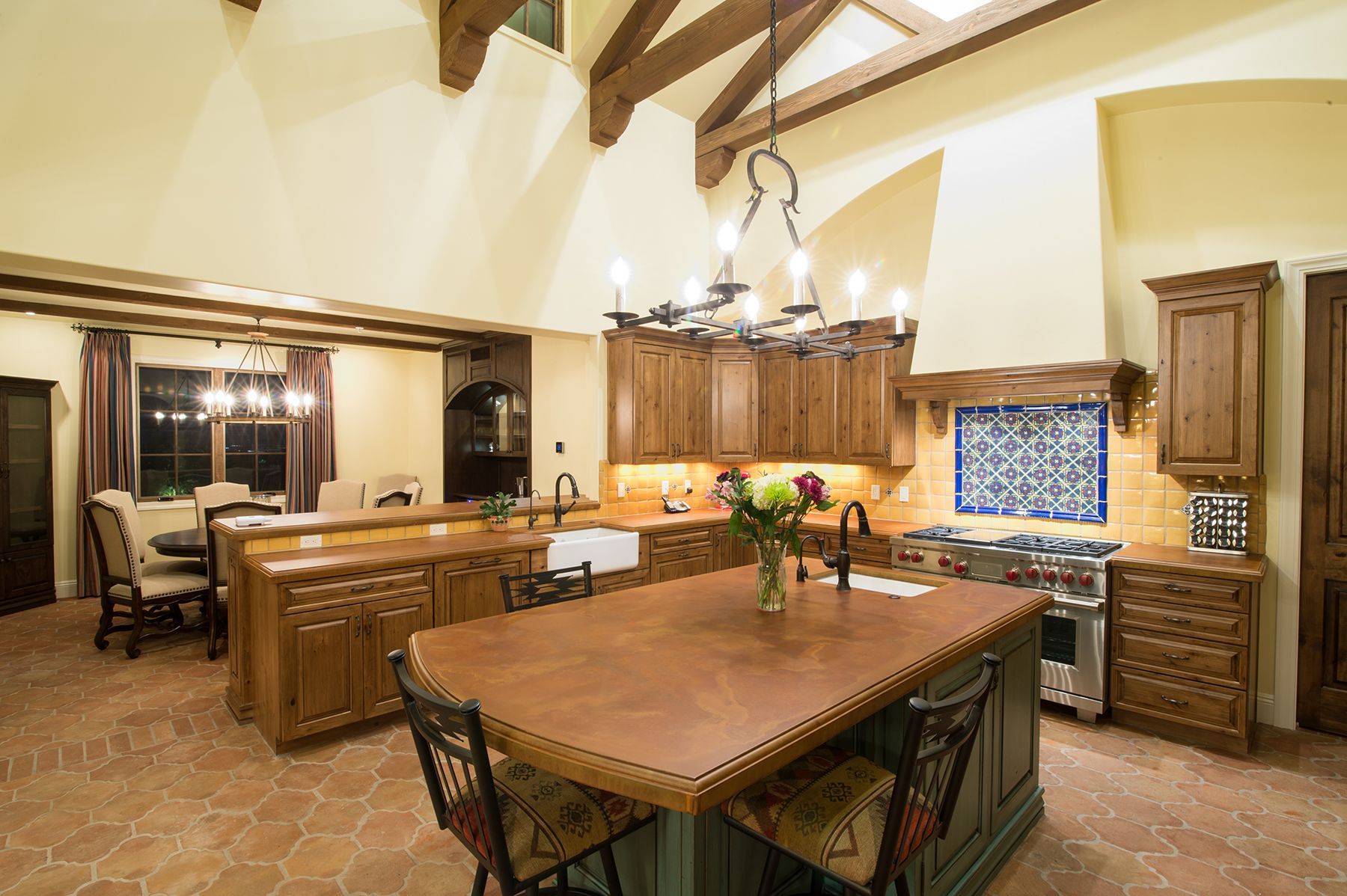 There is a large island in the middle of the kitchen.