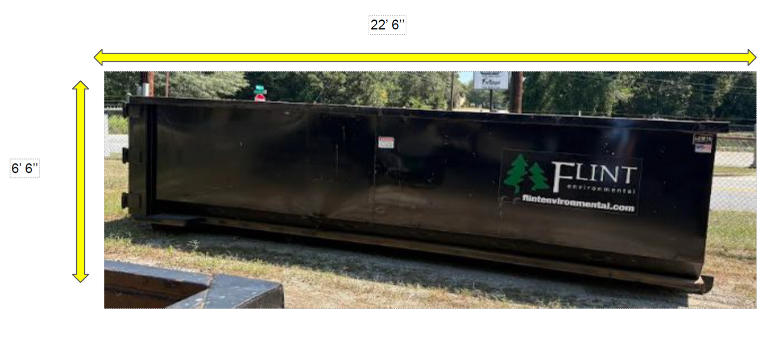 Black dumpster with dimensions labeled 6 feet tall and 22 feet long, parked outdoors.
