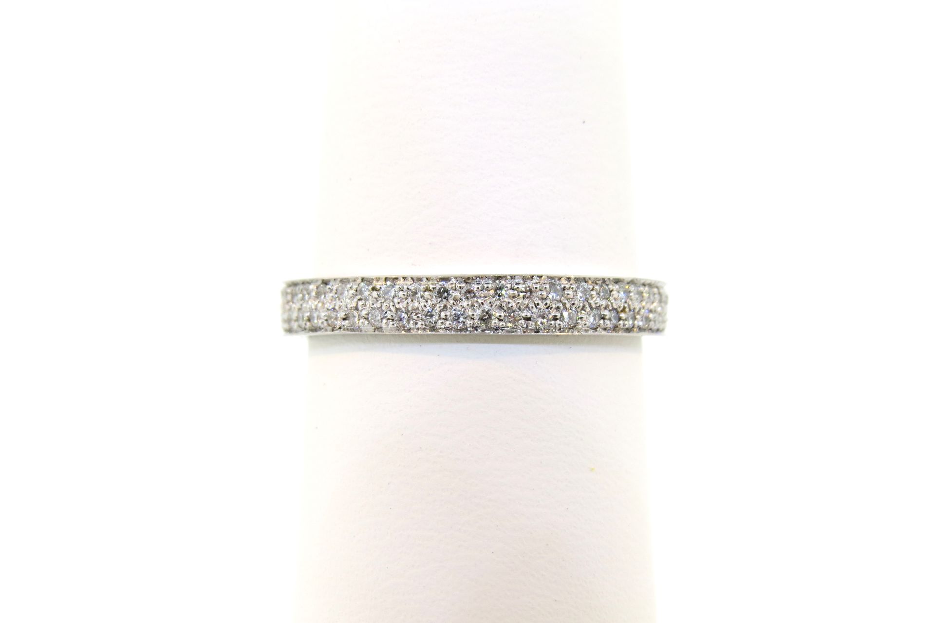 Silver rhinestone-studded bracelet on a white background