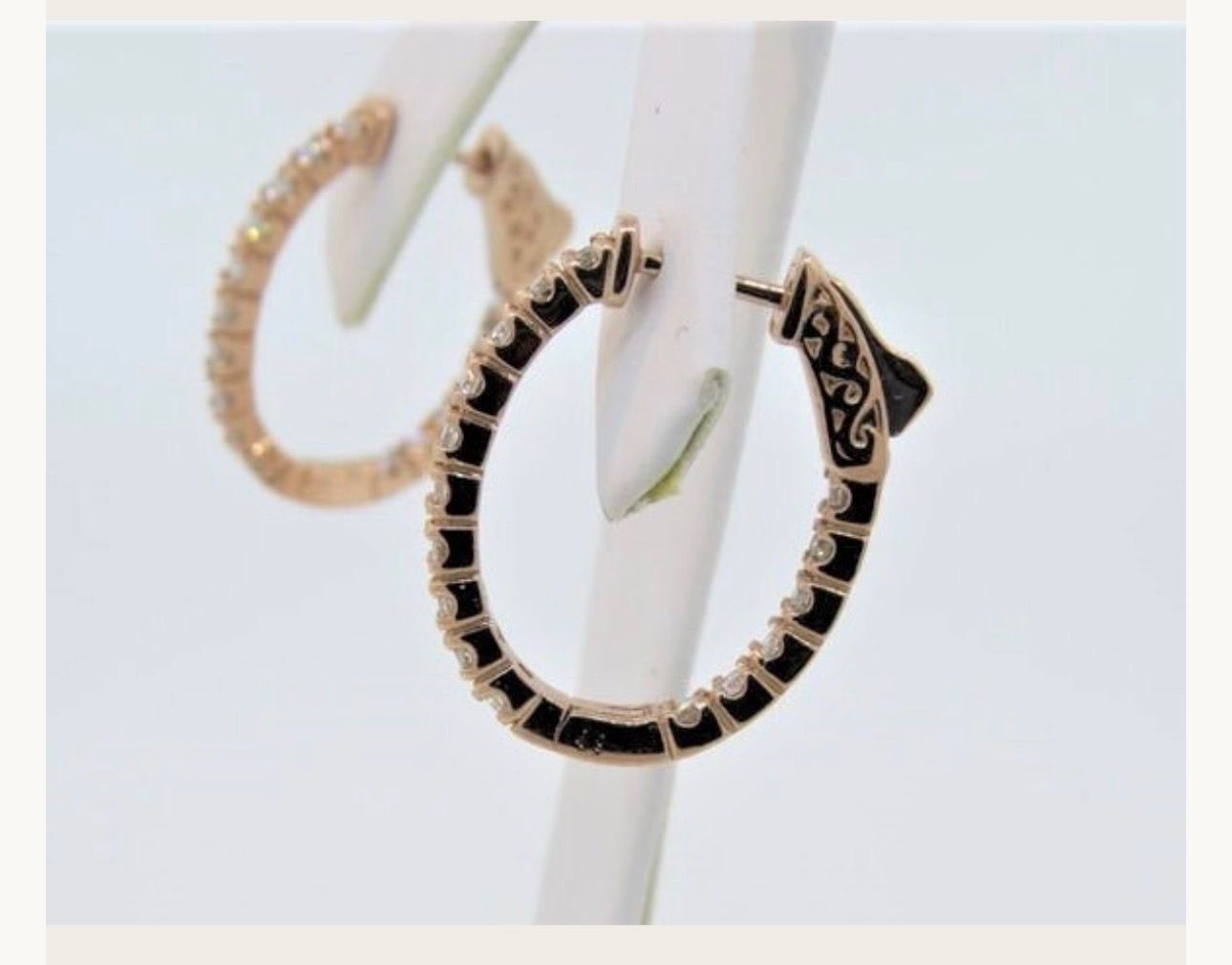 Small gold-colored decorative horizontal bar centered on a white background