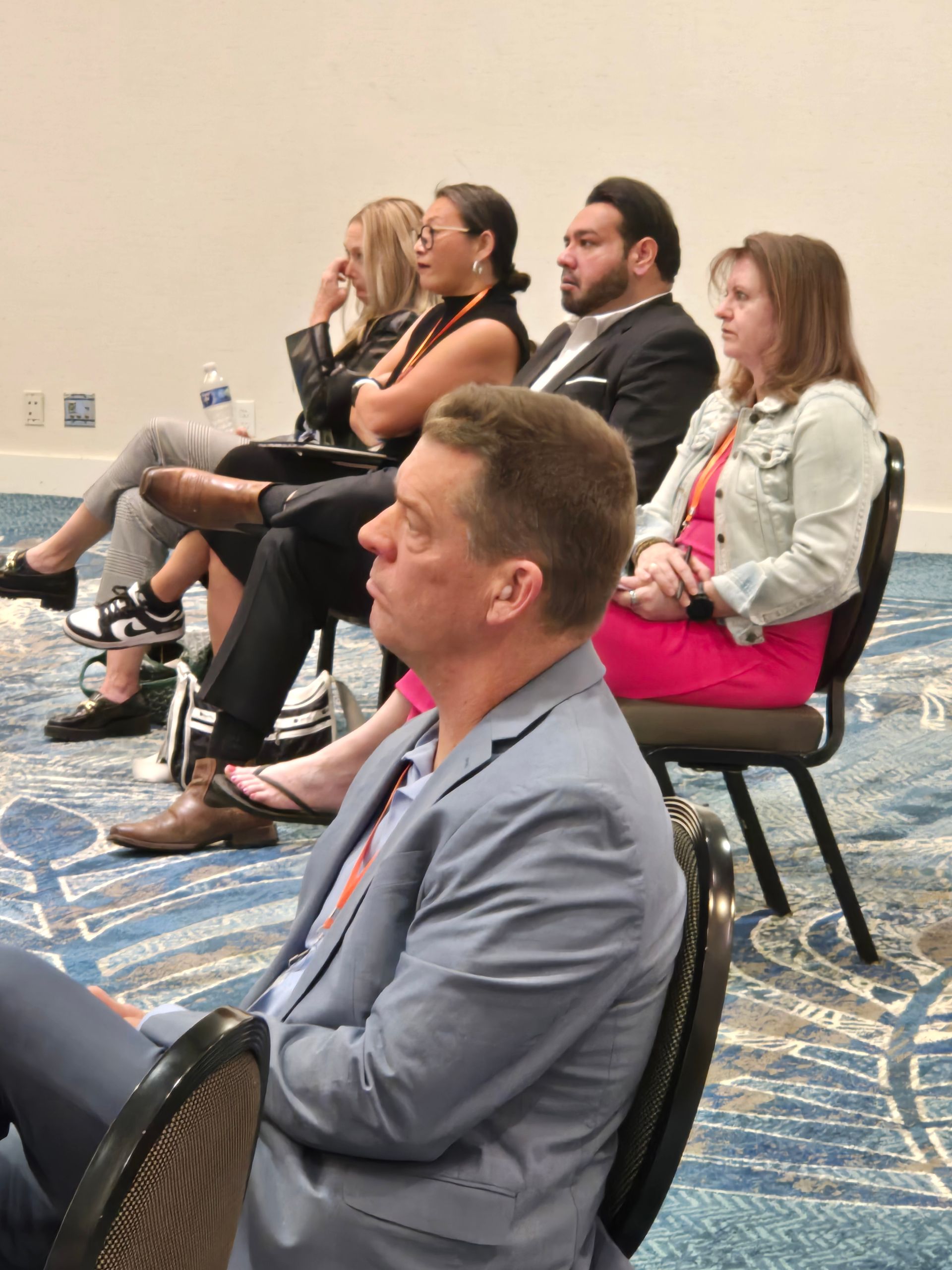 attendees listening intently
