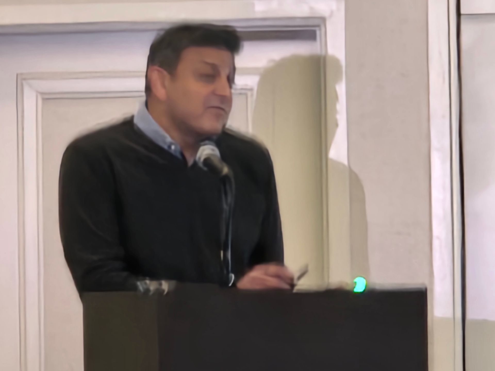 Speaker at podium