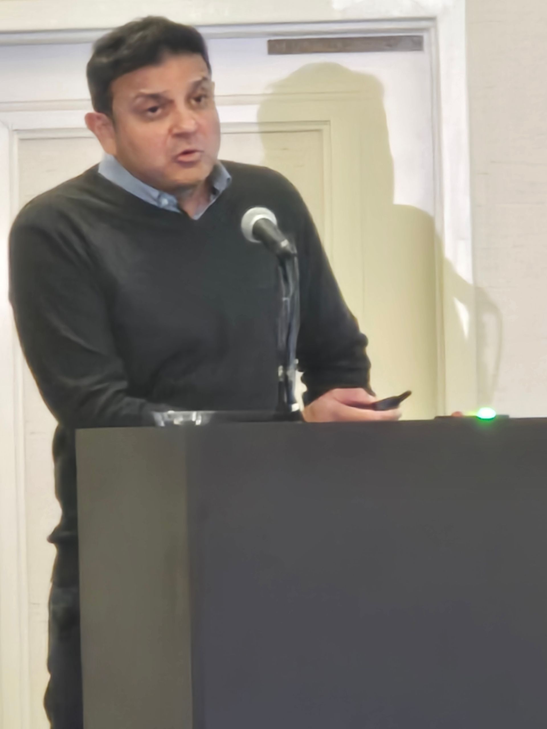 Speaker at podium